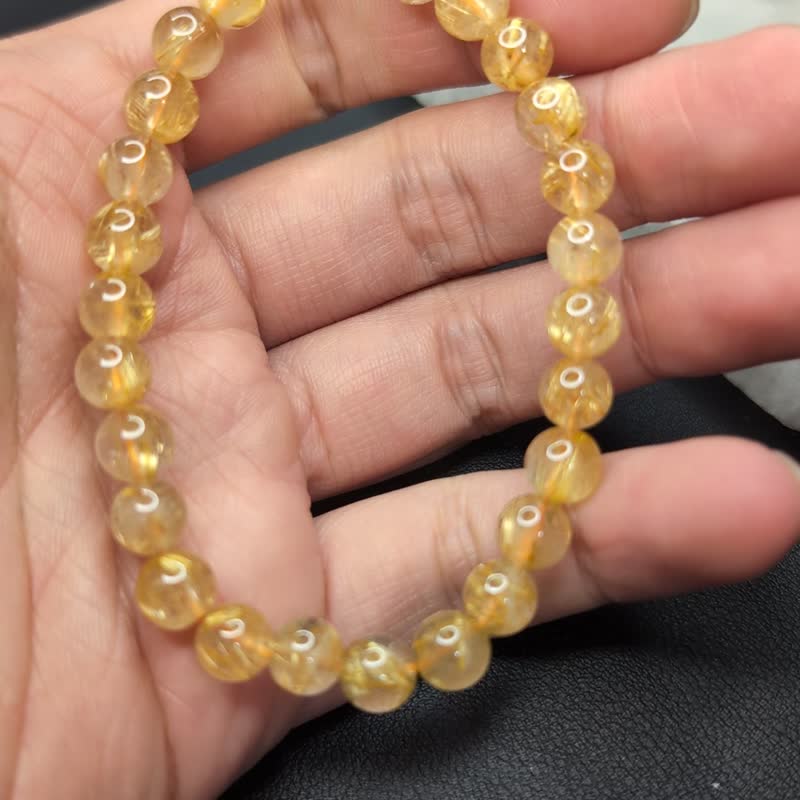 [Customized products] Blonde crystal Brazilian 4-14mm bracelet natural crystal gold titanium hair crystal - Bracelets - Crystal 